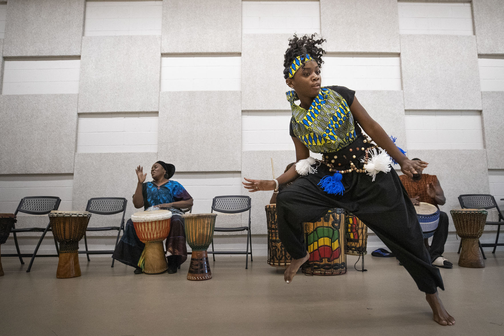 Kwanzaa dancer and drummer